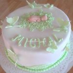 Bielo-zelená krstinová torta s bábätkom